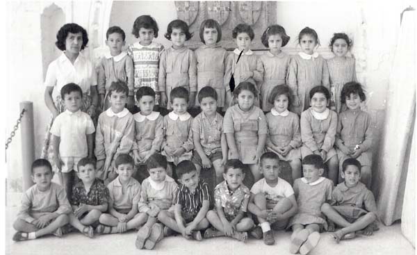 196n Kindergarden_2ndGrade(souren second from left middle row)