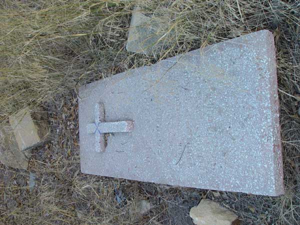Knocked over tombstone